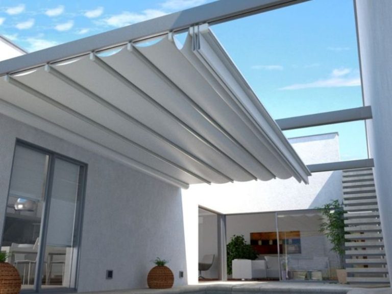 awnings-white-awnings-being-retracted-into-casing-min