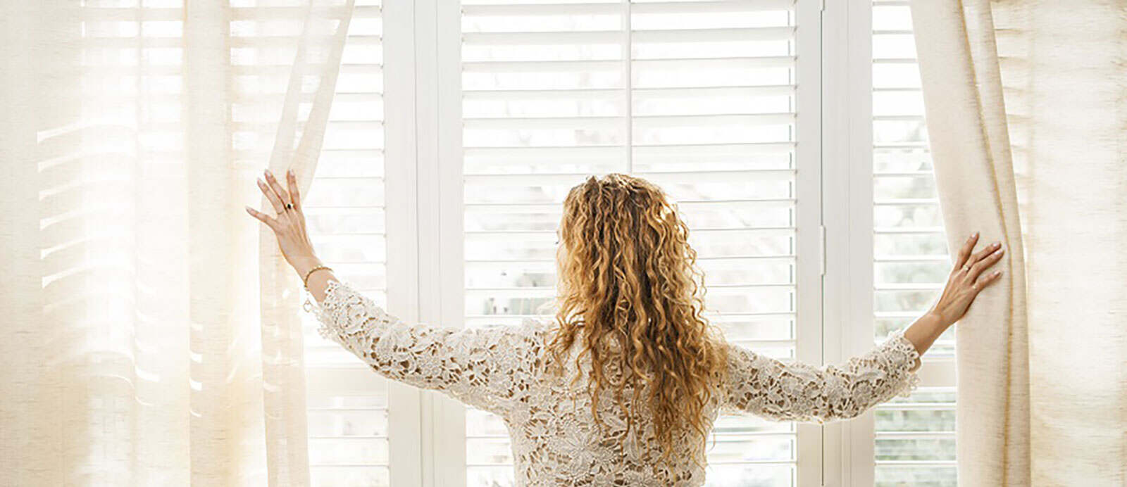 plantation shutters with sheer curtains